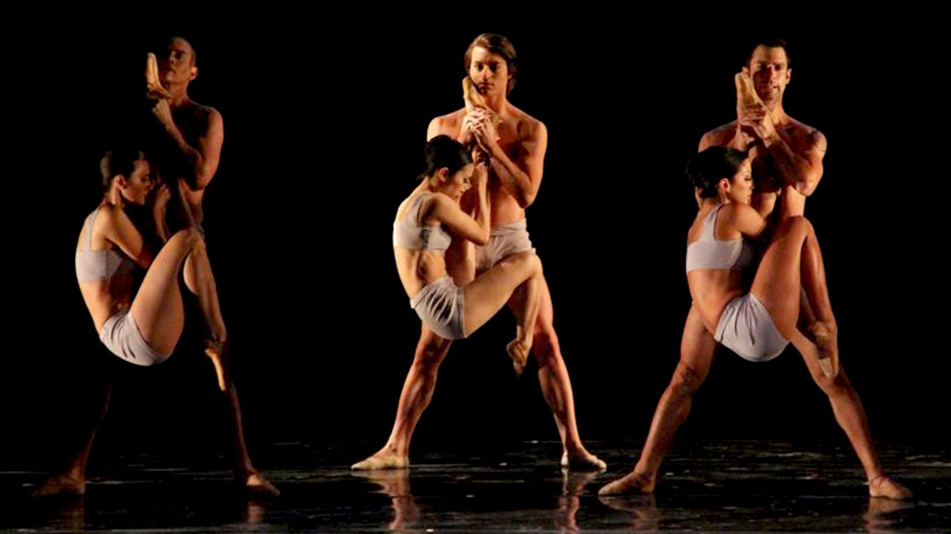Three couples from Elizabeth Wistrich's multimedia ballet "Enigma" performed by City Ballet of San Diego